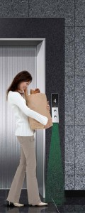 The "touchless footbutton" feature comes in handy for people carrying grocery bags or other loads in their hands. (Hyundai Elevator)