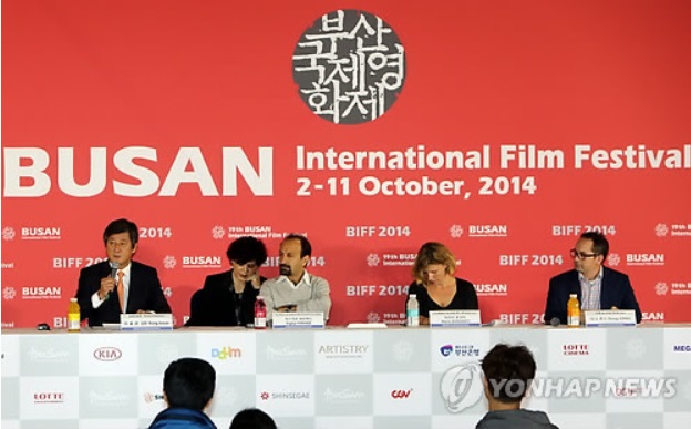 The director (first from the left) is making a speech at an event of the BIFF (image courtesy of Yonhap)