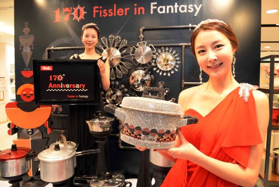 A giant fish made out of cooking utensils is on display during a  promotional event by German cookware maker Fissler at Jiuguang City Plaza  in Shanghai Stock Photo - Alamy