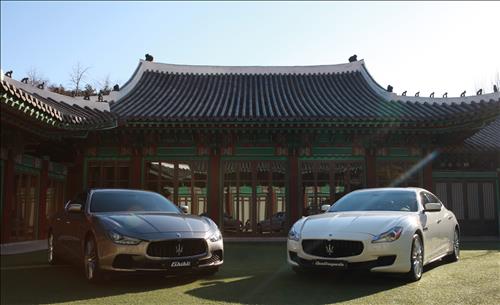 Italian luxury car maker Maserati S.p.A.'s Ghibli S Q4 (L) and the Quattroporte Diesel are put on display during a media event held in Seoul on Feb. 12, 2015. (photo courtesy of Maserati)