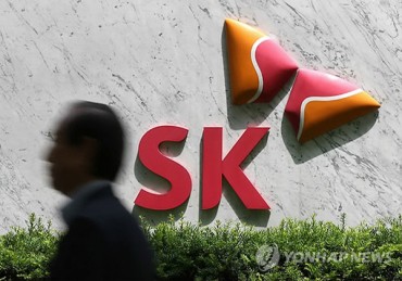 Two SK Firms to Merge, Cementing Chairman’s Grip