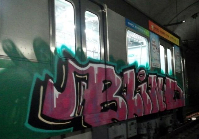Two foreigners broke into a Daegu subway station at night and spray-painted graffiti on a train car. (image: Daegu Metropolitan Transit Corp.)