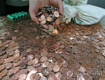 Shameful Employer Pays Back Wages with 10 Won Coins
