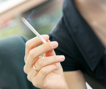 Number of Male Smokers Halved in 20 Years