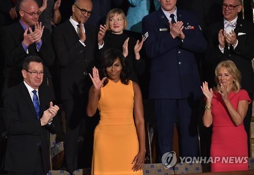 According to a report from ABC news, American First Lady Michelle Obama’s dress received more attention than President Barack Obama’s last State of the Union address. (Image : Yonhap)