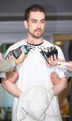 American citizen Arthur Patterson convicted of murdering a South Korean college student in 1997 speaks to reporters after being extradited to South Korea at Incheon airport, west of Seoul, on Sept. 23, 2015. He was sentenced to 20 years in prison on Jan. 29, 2016 for stabbing Cho Joong-pil multiple times at a Burger King in the popular foreigner district of Itaewon in central Seoul. (Image : Yonhap)