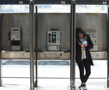 Goodbye Faded Memories: Phone Booths Disappear