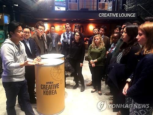 Harvard students meet TV producers and officials during their visit to CJ E&M in Seoul on March 18, 2016. (Image : CJ)