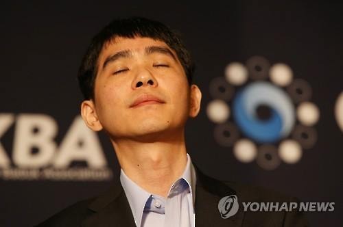 South Korean Go player Lee Se-dol reacts during the post match press conference at Four Seasons Hotel in Seoul on March, 9, 2016 after he lost a Go match against Google DeepMind's artificial intelligence program AlphaGo (Image : Yonhap).