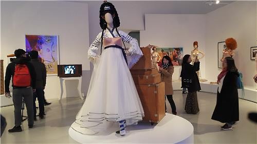 A new iteration of traditional Korean costume by Jean Paul Gaultier is displayed at Dongdaemun Design Plaza in central Seoul on March 25, 2016. (Image : Yonhap)