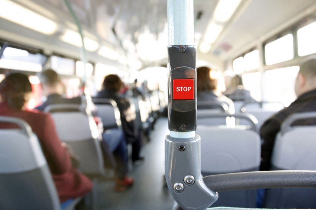 Currently there are red ‘request stop’ buttons by windows and on poles inside Korean public buses. People press these buttons if they wish to get off at the next station, alerting the driver to stop the bus. (image: KobizMedia/ Korea Bizwire)