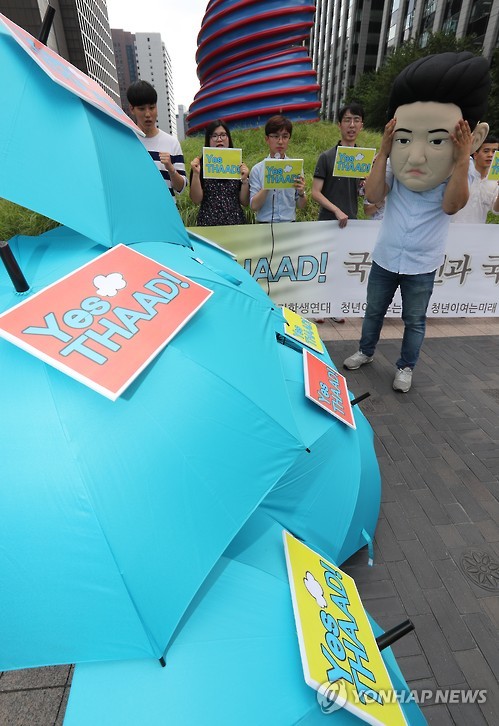 But on Thursday morning, members of conservative youth groups gathered in central Seoul, supporting the decision and emphasizing the importance of the missile defense system.