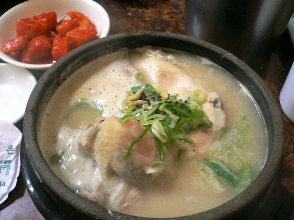 Samgyetang is a traditional chicken soup made with a whole young chicken stuffed with ginseng, sticky rice and garlic. It is widely recognized in the country as an energy-boosting meal during the summer months. (image: Wikimedia)