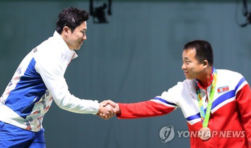 North and South Korean Medalists Exchange a Friendly Handshake at Rio 2016
