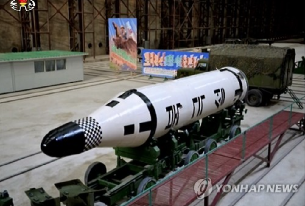 North Korea's submarine-launched ballistic missile (SLBM), "Pukguksong," is being transported to be loaded onto a sub in this photo released by the (North) Korean Central TV on Aug. 25, 2016. (image: Yonhap)