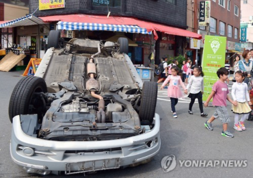 Overturned Vehicle Marks Coming Car Free Day