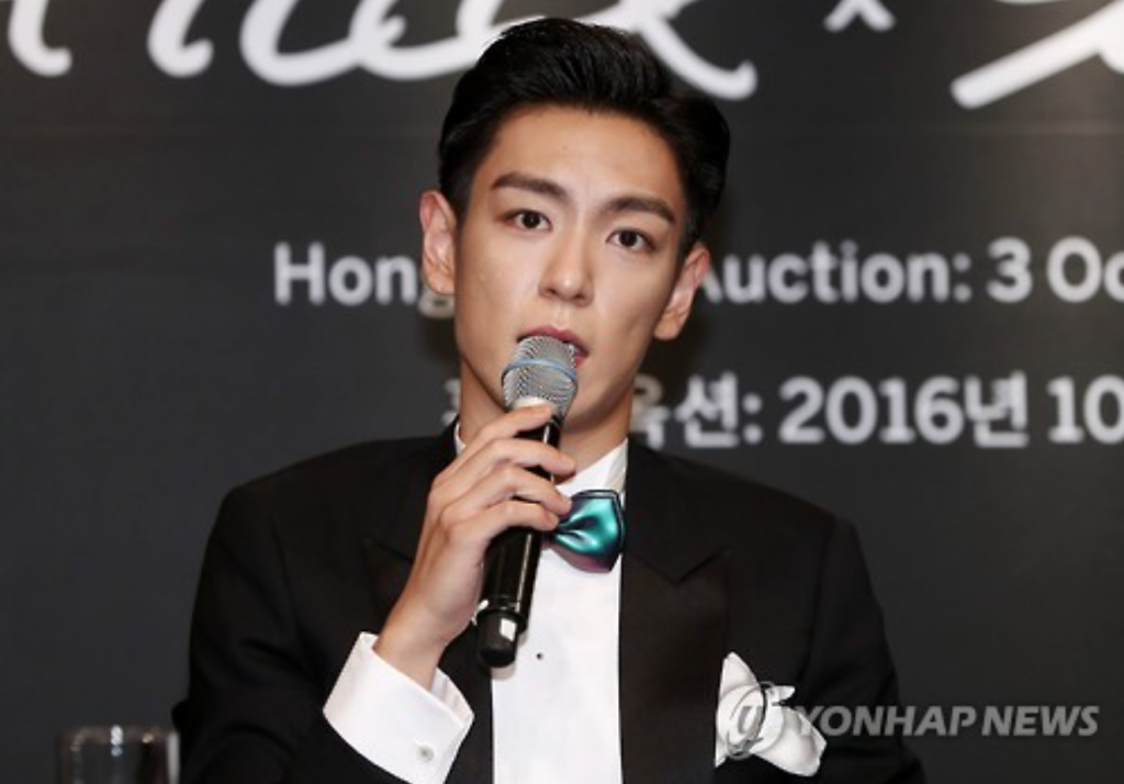 BigBang's T.O.P speaks during a news conference in Seoul on Sept. 19, 2016, for "#TTTOP," a charity auction set to open on Oct. 3 in Hong Kong. (image: Yonhap)