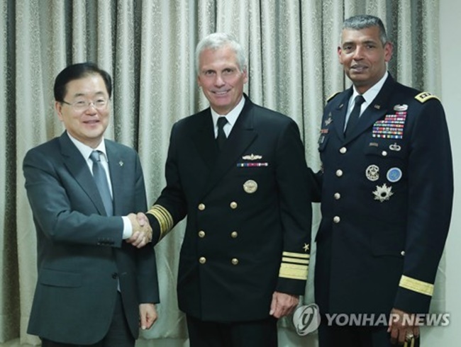 Chung Eui-yong (L), director of South Korea's presidential National Security Office, shakes hands with V. Adm. James Syring, director of the U.S. Missile Defense Agency, before their meeting in Seoul on June 5, 2017. (Image: Photo courtesy of Cheong Wa Dae)