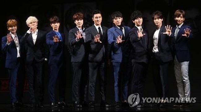 South Korean boy group Super Junior poses for a photo during a publicity event in Seoul on July 15, 2015, to promote their special album "Devil." (Image: Yonhap)
