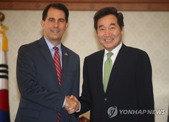Gov. Scott Walker has been on a four-day visit to South Korea since Wednesday, leading an economic mission of about 20 people that includes government officials and business leaders in the state. It is his first visit to Korea. (Image: Yonhap)