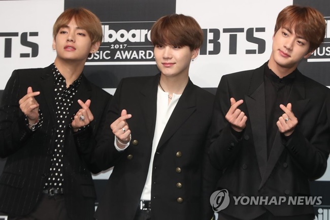 "Whenever we're asked about our goals, we say that we want to enter the Hot 100. But a lot of albums have to be sold and our music has to be streamed a lot. And there's also the radio play factor so it isn't easy," member Suga said during a press conference held at the Lotte Hotel in central Seoul. (Image: Yonhap)