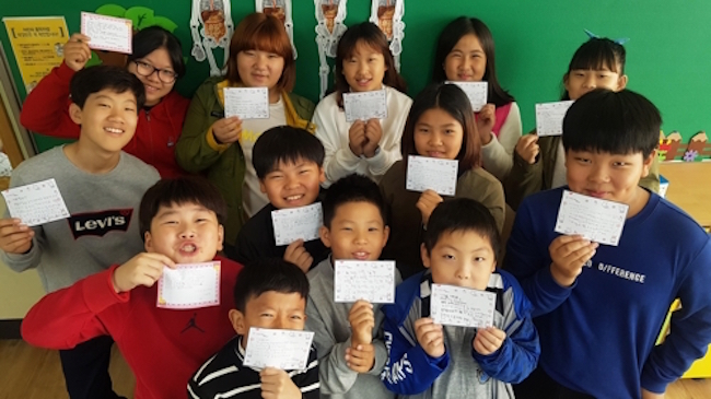 Elementary schoolchildren on Baengyeong Island, located a stone's throw from the maritime military demarcation line between the two Koreas, have sent handwritten letters to the U.S. embassy in Seoul for the soon-to-visit President Donald Trump, asking that “There be no war”. (Image: Baengyeong Elementary)