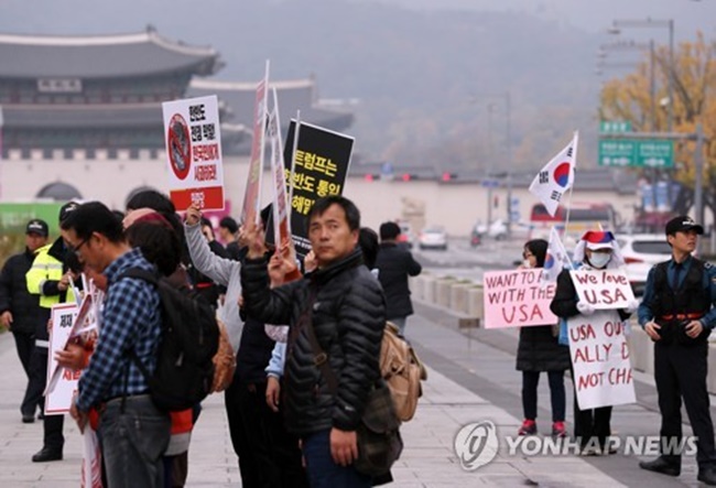 At least 1,000 citizens will gather for an anti-Trump rally in Jongno, central Seoul, according to the groups. Similar protests will take place concurrently in other major cities, including Gwangju, Daejeon, Ulsan and Changwon. (Image: Yonhap)