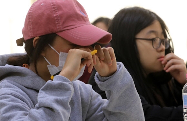 With the unprecedented postponement of the country-wide college entrance exams declared yesterday, the nation's 18-year olds have seen their fair share of unexpected disruptions to their academic lives, occurrences that have left some to wonder whether being born in 1999 was a stroke of bad fortune. (Image: Yonhap)