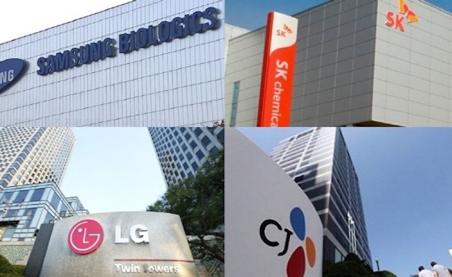 Listed units of South Korea's top 10 conglomerates saw their operating incomes almost double to a record high in the first three quarters of the year, with chip giants Samsung Electronics Co. and SK hynix Inc. taking up more than half of the total, a market tracker said Monday. (Image: Yonhap)