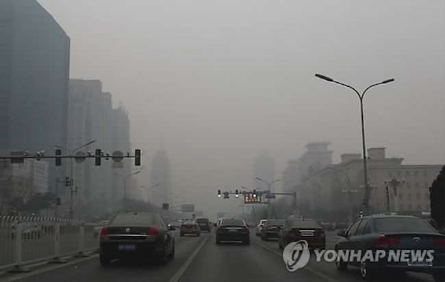 As photos of smog-filled Beijing's skyline indicate, air pollution is critical there, generated by both regional denizens who rely on coal for heating and the manufacturing sector spread throughout the region. (Image: Yonhap)