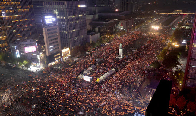 Nearly a quarter said they had participated in the candlelight protests (28.4 percent), and three quarters said they approved of them (75.1 percent). (Image: Yonhap)