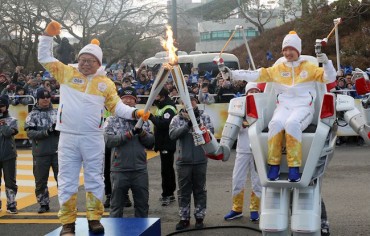 History Made as Robots Carry Olympic Torch