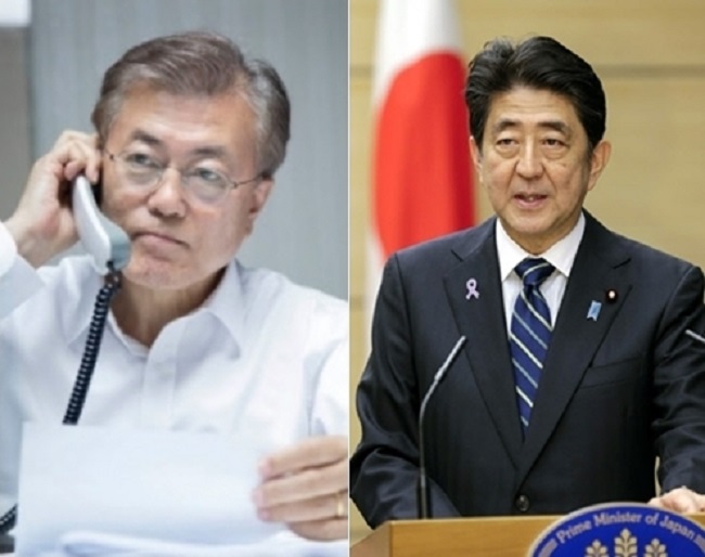 South Korean President Moon Jae-in and Japanese Prime Minister Shinzo Abe are set to hold bilateral talks Friday, amid a renewed dispute over Japan's wartime sexual slavery of Korean women. (Image: Yonhap)