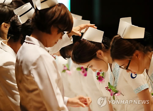 Meaning “to burn” (extended meaning is “to burn until [he or her] becomes proficient), taeum is a word denoting bullying of a junior nurse by a senior under the guise of mentorship. (Image: Yonhap)