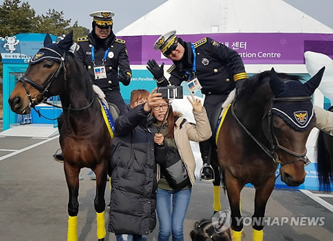 Police on horseback (Image: Yonhap)