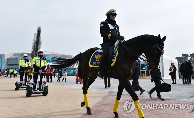 Back on the Olympics grounds, meanwhile, officers on horseback, an uncommon sight for South Koreans hailing from Seoul, and on two-wheel standing scooters carried out patrols to the delight of many. (Image: Yonhap)