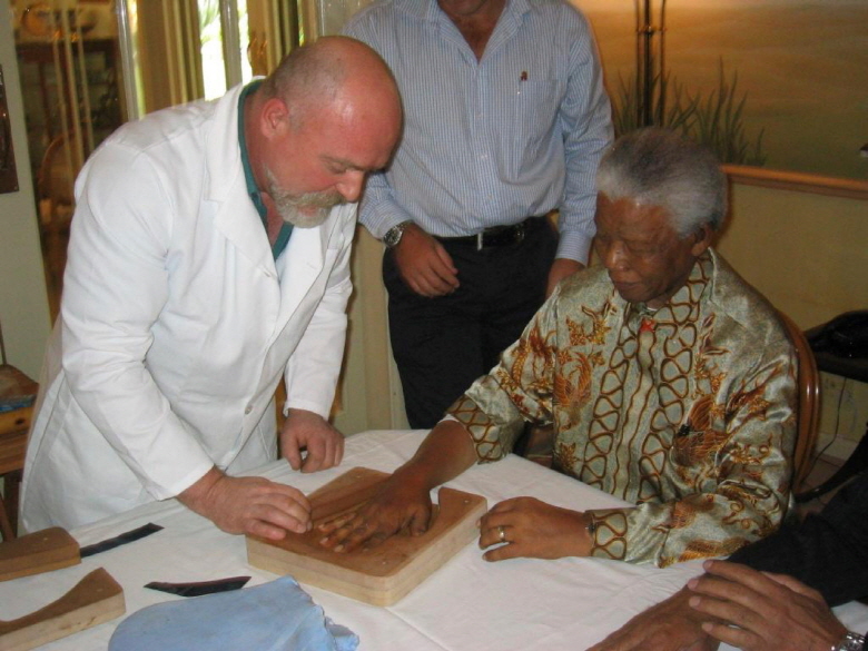 Arbitrade Completes the Purchase of the First of the Mandela Golden Hands Artifacts