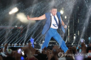 Psy Beats Sweltering Summer Heat with Water-Shower Show