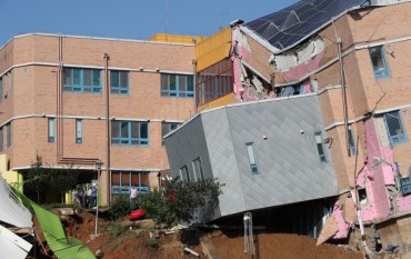 Kindergarten Tilts After Retaining Wall Crumbles at Construction Site