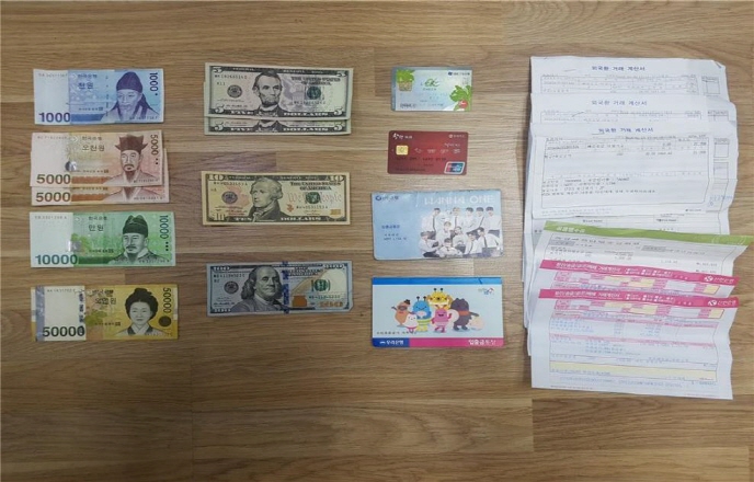 Cash seized from arrested Liberians. (image: Incheon Metropolitan Police Agency)