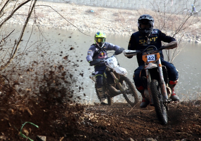 Off-road Bike Racing Across Mountains and Streams