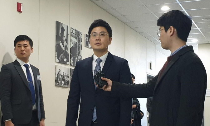Yang Min-suk, chief executive of YG Entertainment, speaks to reporters before attending his company's regular shareholder meeting in Seoul on March 22, 2019. (Yonhap)