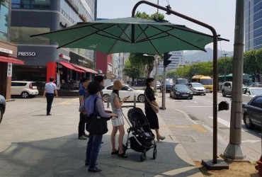 Pedestrian Crossing Parasols Spreading Across S. Korea