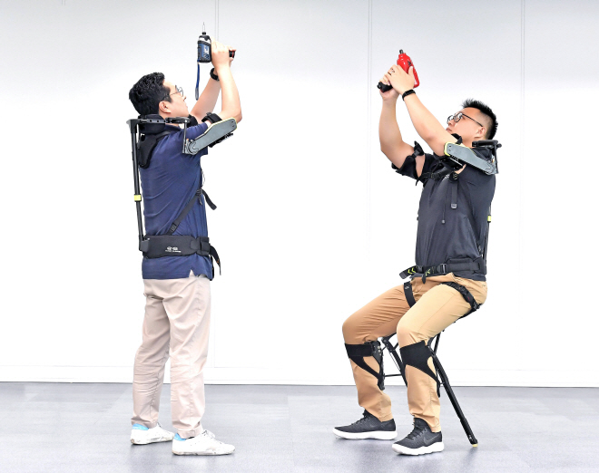 This photo provided by Hyundai Motor Group shows Vest EXoskeleton (VEX), a wearable robot developed by the group.