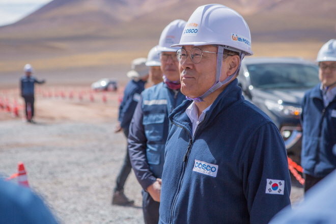 This file photo, provided by POSCO on Oct. 23, 2019, shows POSCO Chairman Choi Jeong-woo inspecting a construction site of a lithium extraction demo plant in Argentina.