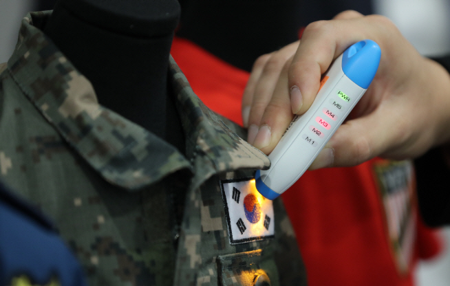The technology can be used not only for labels attached to clothes, but also for embroidery attached to uniforms or sports club uniforms. (Yonhap)