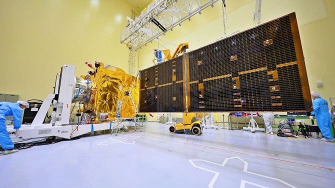 This file photo provided by KARI of Dec. 5, 2019, shows engineers checking the Chollian-2B satellite in Daejeon, 164 kilometers south of Seoul.