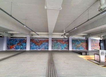 Artists Paint Mural at Oil Tank Culture Park in Seoul