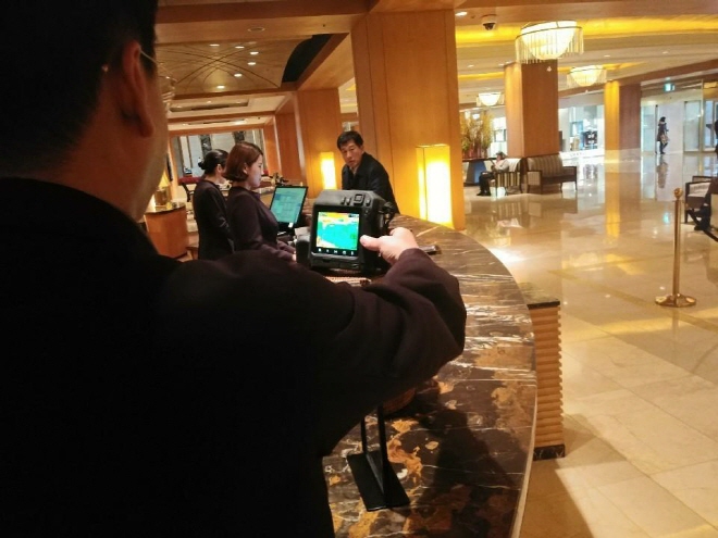 Thermal sensors check the body temperatures of people arriving at Lotte Hotel in Seoul. (image: Lotte Hotel)