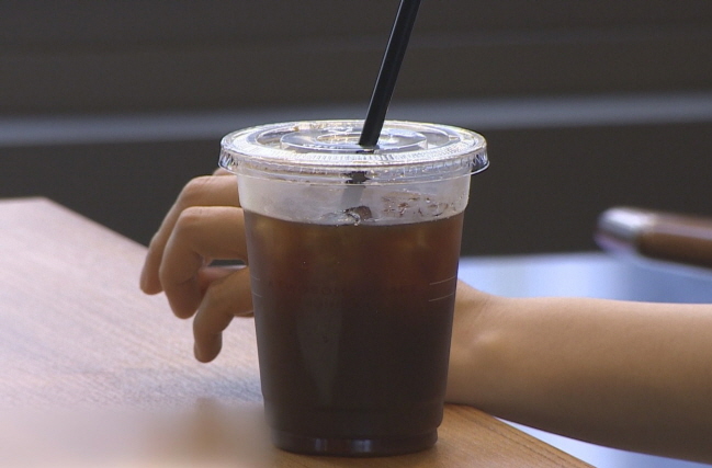 This image, provided by Yonhap News TV, shows a plastic cup with coffee.
